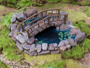 estanque con puente para escenografía · Estanque con puente de Hagglethorn