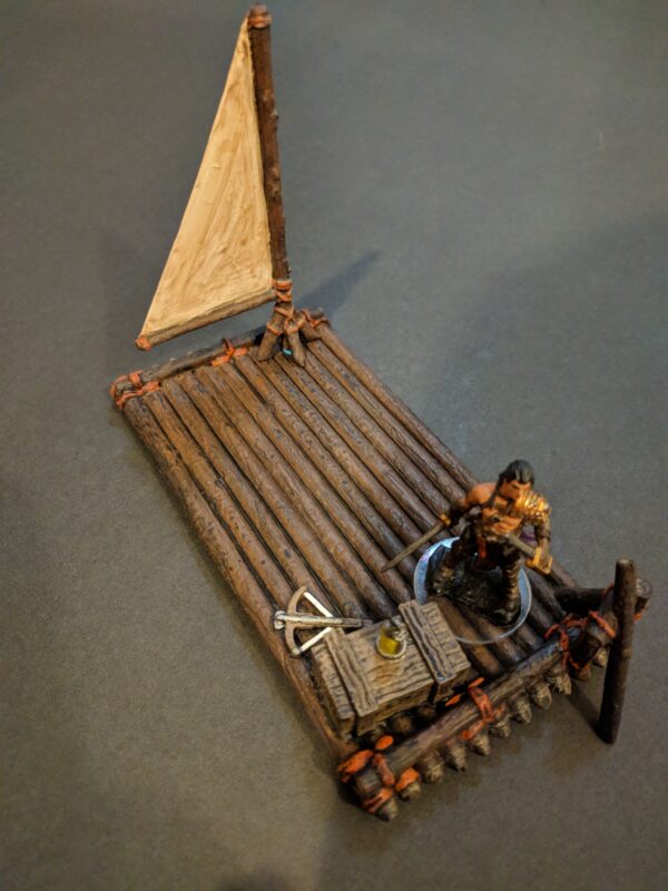balsa con vela para escenografía · Balsa de río con vela